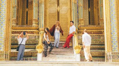 Travellers at the Royal Palace in Bangkok, Thailand